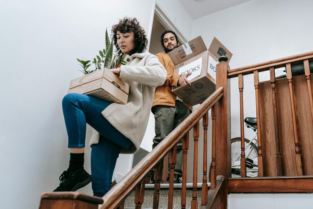 moving-out-people-carrying-boxes.jpg