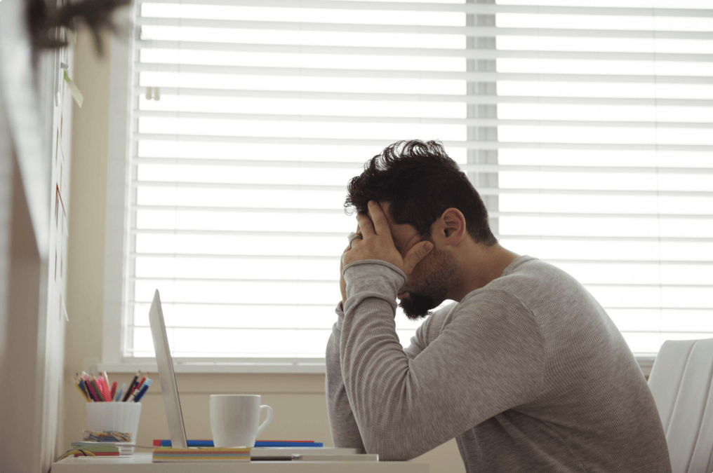 stressed-man-at-desk.png